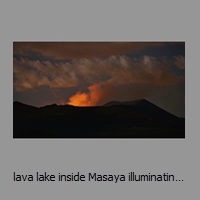 lava lake inside Masaya illuminating steam cloud
